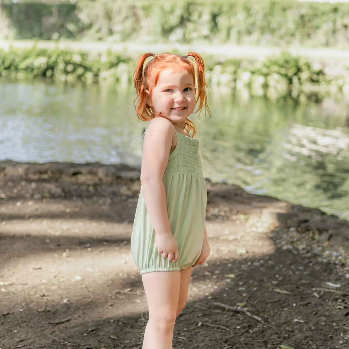 Smocked Bubble Romper in Basil Main image