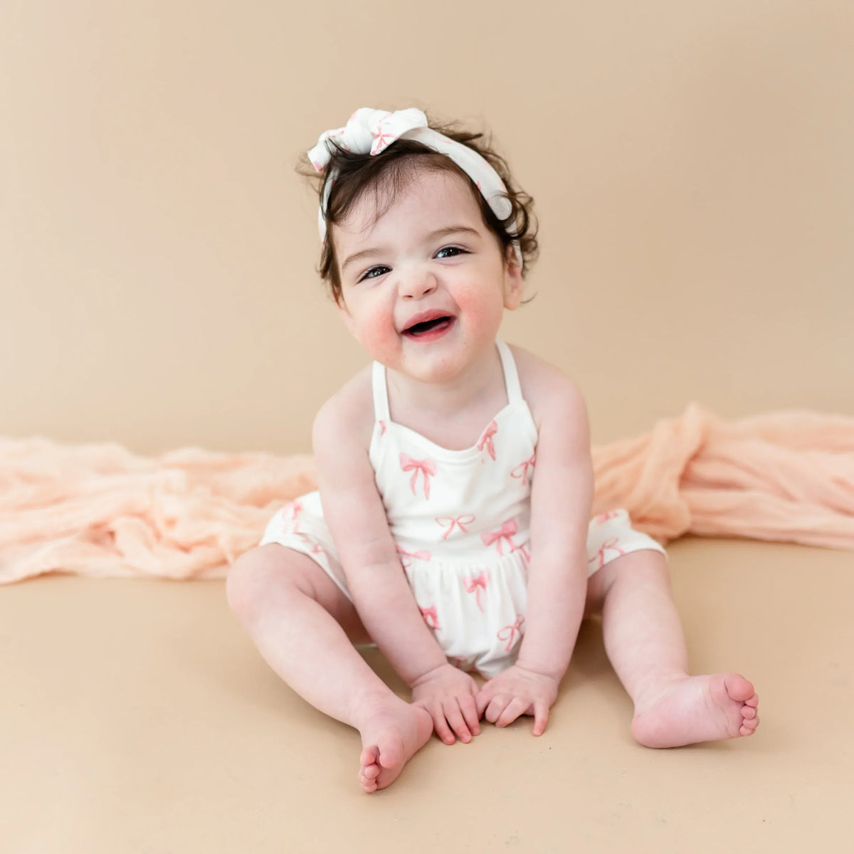 Spaghetti Strap Ruffle Romper in Bow Main image
