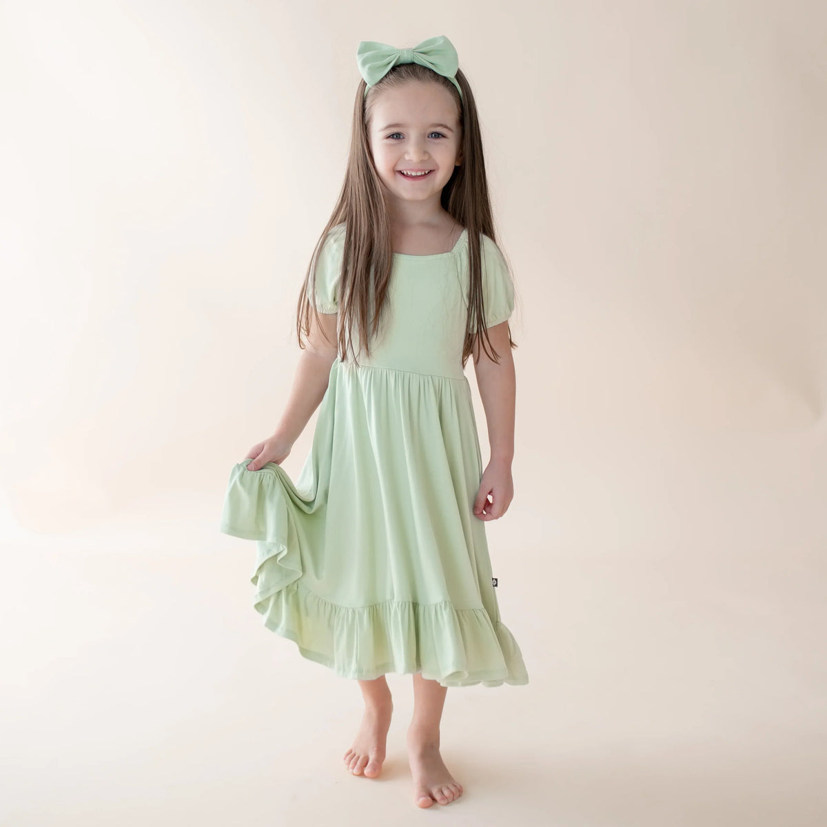 Puff Sleeve Twirl Dress in Basil Main image