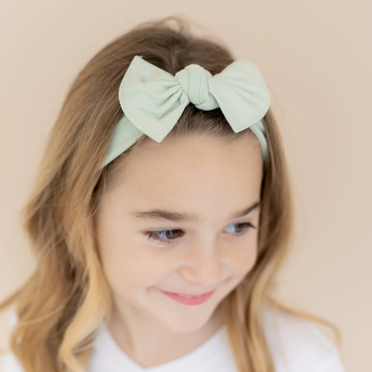 Knotted Bow Headband in Basil Main image