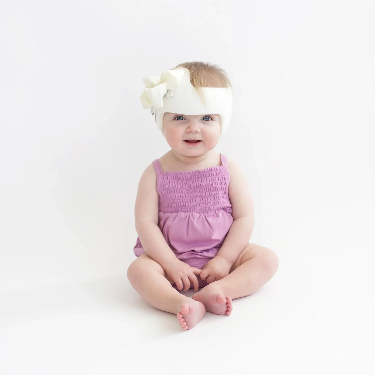 Smocked Bubble Romper in Poi Main image