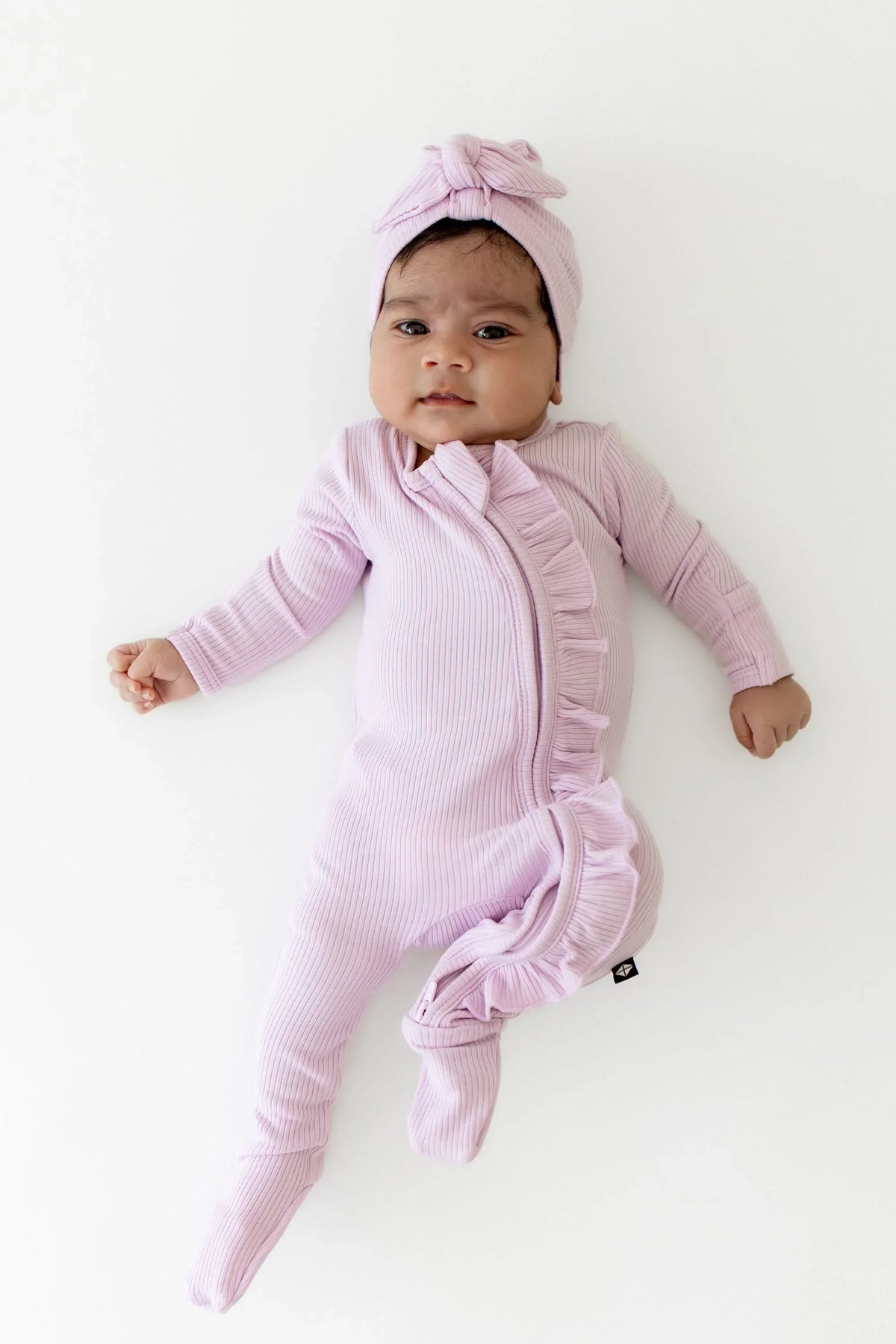 Ribbed Ruffle Zipper Footie in Thistle Main image