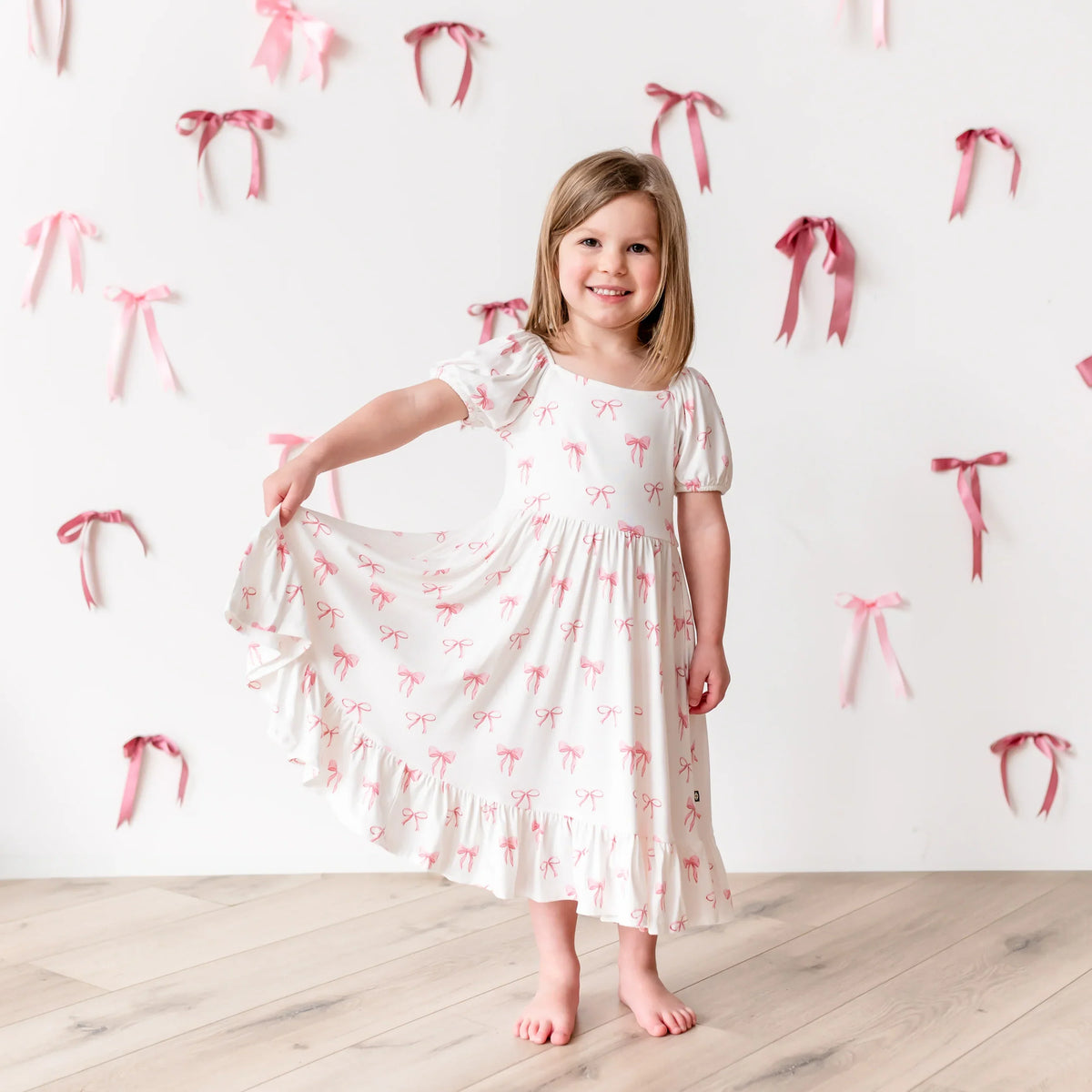 Puff Sleeve Twirl Dress in Bow Main image